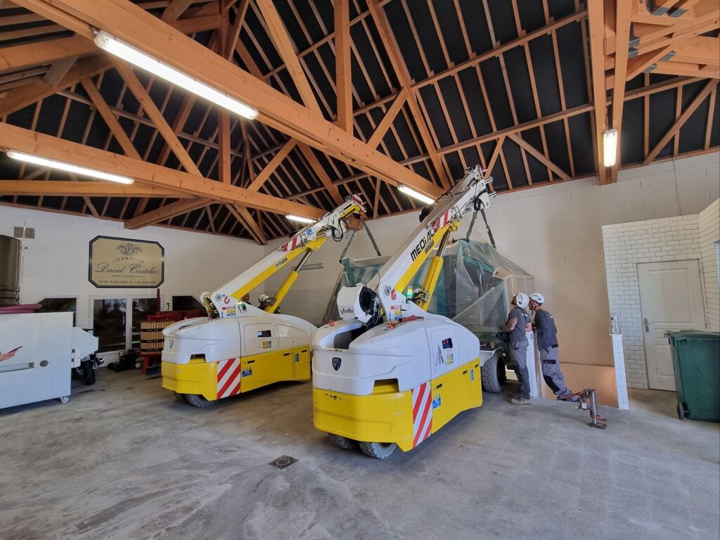 2 x valla cranes lifting winepress